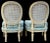 This is a pair of Hollywood Regency Era Italian slipper chairs newly upholstered in a cut velvet. The frame is an ivory...