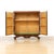 A striking vintage cocktail cabinet finished in richly figured rosewood veneer with dramatic book matched grain...