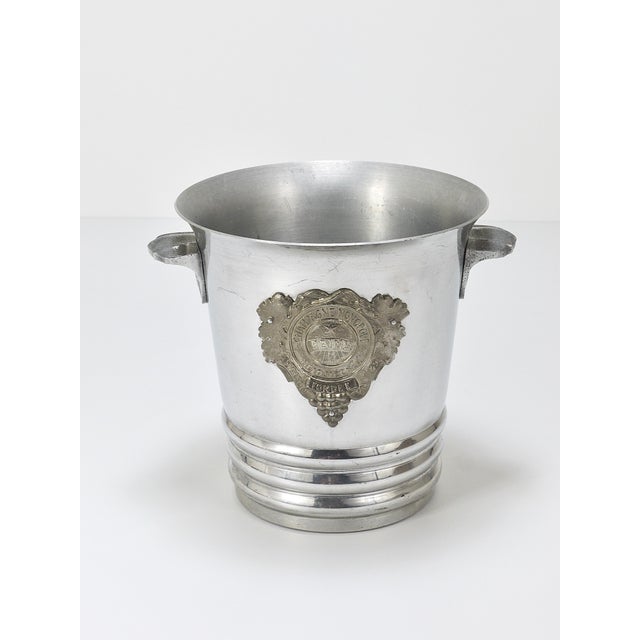 A beautiful Art Deco Champagne bucket from the 1930s / 1940s by Champagne Monopole Heidsieck & Co. Made of polished...