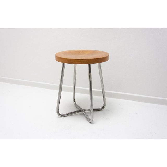 This chrome-plated stool was made by Slezák company, which focused on the production of tubular furniture, in the 1930s....