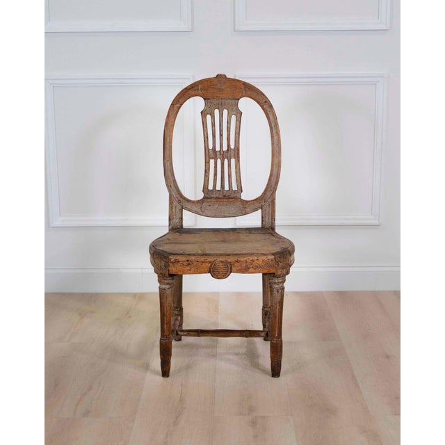 A charming 19th century Swedish provincial Gustavian chair displaying the restrained elegance and practical beauty...
