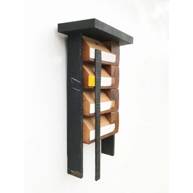 Artwork made found objects (table legs) ebony wood & latex scott troxel is and american abstract artist born in 1971 who...