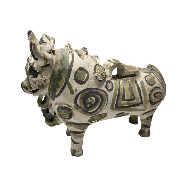 Handmade ceramic Torito de Pucará from the Pucará region of southern Peru. These bulls have been produced since at least...