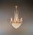 This impressive antique chandelier, dating from around 1930, draws its design inspiration from the classic Empire...