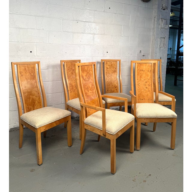 Stunning set of six vintage burl wood dining chairs, a perfect blend of organic elegance and bold mid-century styling....