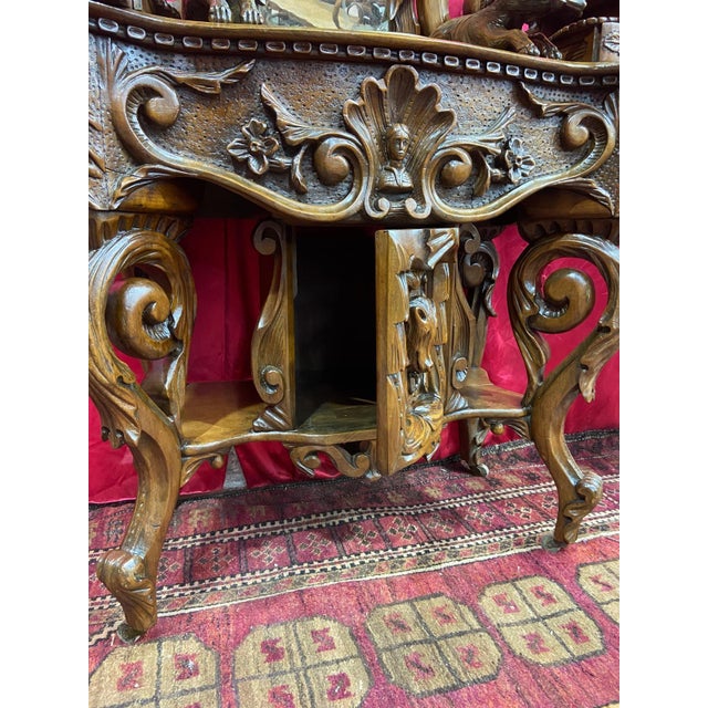 19th century washbasin from Northern Italy, baroque, eclectic and rich in wood carvings, with original central mirror and...