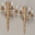 A pair of early 20th Century Napoleon III style French cast bronze sconces, each with three scrolled arms. Classical form...