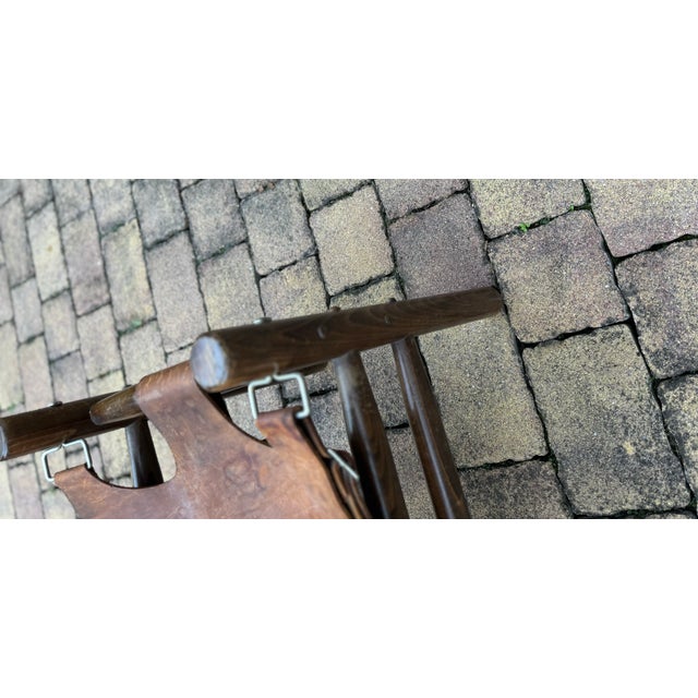 Original and unique vintage Safari pouf in the manner of Swedish furniture designer, Arne Norell, from the same period, it...