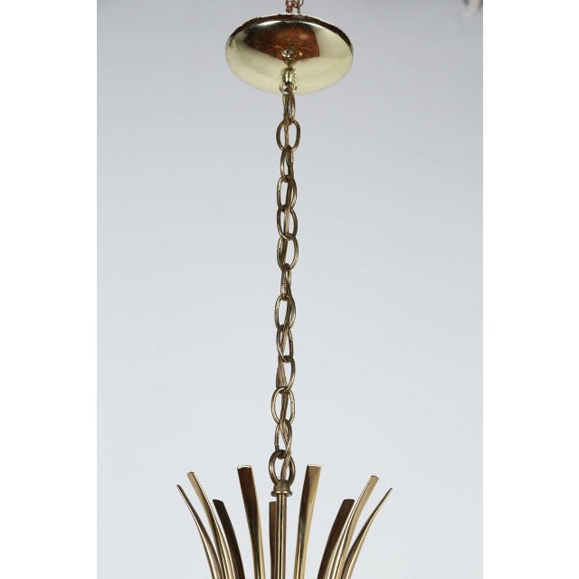 Mid-Century Italian fixture; newly rewired with for nine candelabra bulbs, each bulb can be up to 60 watts.