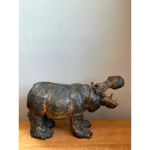 Whimsical and full of rustic character, this vintage boho slab-built ceramic hippopotamus sculpture showcases an...