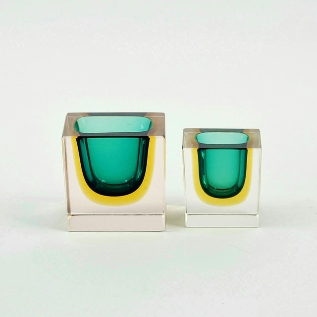 Stunning pair of mid century modern sommerso Murano glass catchalls designed by Flavio Poli for Seguso Vetri d'Arte...