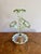Quality antique 19th century Vaseline and green glass epergne, having a quality Victorian glass epergne with one tall...