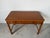 A beautifully crafted vintage Drexel writing desk featuring, elegant brass handles, and three drawers for ample storage....