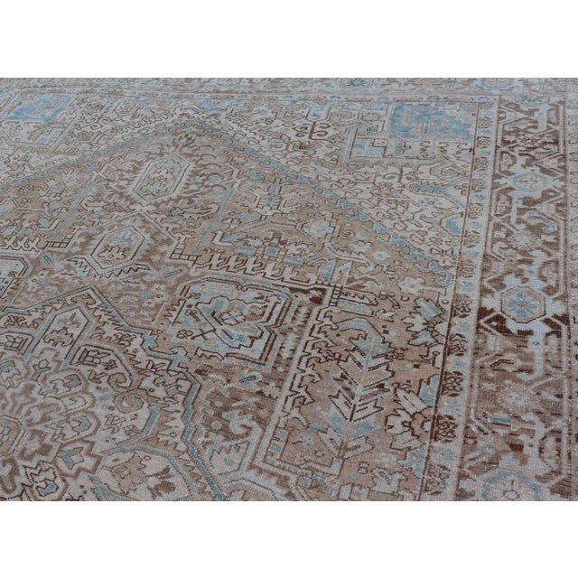 Intricately designed geometric Persian Heriz carpet in earth tones, rug EMB-9539-P13038, country of origin / type: Iran /...