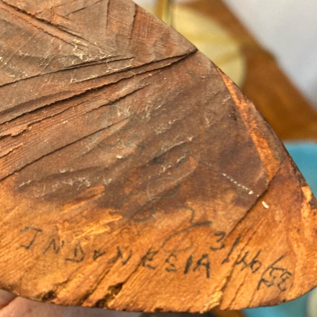 This vintage Bali Dewi Ratih statuette, dated 3/26/1958, is handcarved from rich tropical wood. Inspired by traditional...