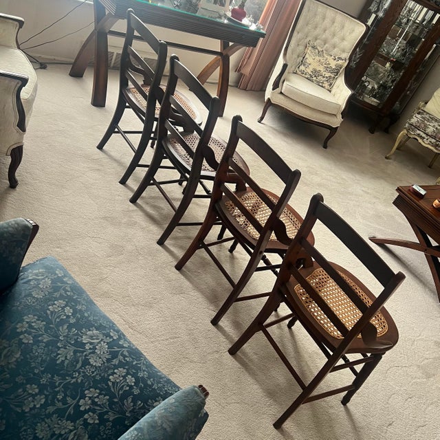 Antique victorian cane seat chairs - Set of 4 Feature ladder backs with arching side rails, a decoratively carved seat...