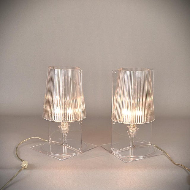 Kartell lamp, Take model designed by Ferruccio Laviani. Made of transparent polycarbonate. The inner surface of the...