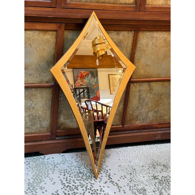 Design Plus Gallery presents the Volante Mirror by Christopher Guy. Made from mahogany the mirror was hand carved and hand...