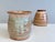 This pair of hand-thrown vases by ceramicist Helma Klett (1908-1996) showcases two of her characteristic decorative...