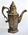 An engraved, silver-inlaid, brass coffee or tea pot, possibly Mosul, Ayyubid Syria-Iraq, late 19 century. Of typical form,...