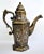 An engraved, silver-inlaid, brass coffee or tea pot, possibly Mosul, Ayyubid Syria-Iraq, late 19 century. Of typical form,...