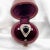 Beautiful vintage heart-shaped ring. Made of 18 carat gold (750 thousandths), this ring is set with a sapphire of...