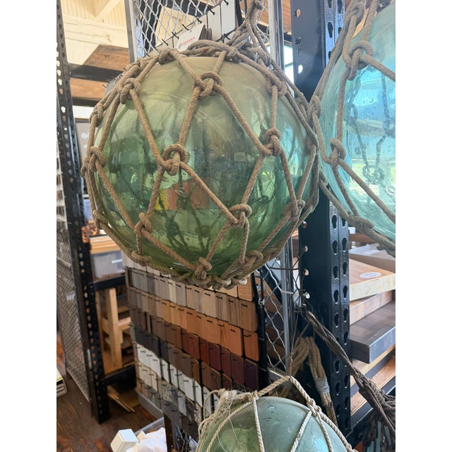 Japanese Antique Japanese Glass Fishing Floats – Hand‑Blown Green Glass With Rope Netting For Sale - Image 3 of 6