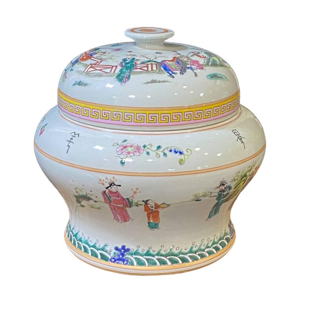 This exquisite lidded Chinese Porcelain Famille Rose Tea Caddy Jar stands 9.5" in height and is 10" in diameter. Its...