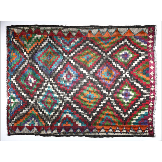 Vintage Anatolian Cicim Kilim with Diamond Motifs – Handwoven Tribal Flatweave This exceptional vintage Cicim kilim is a...