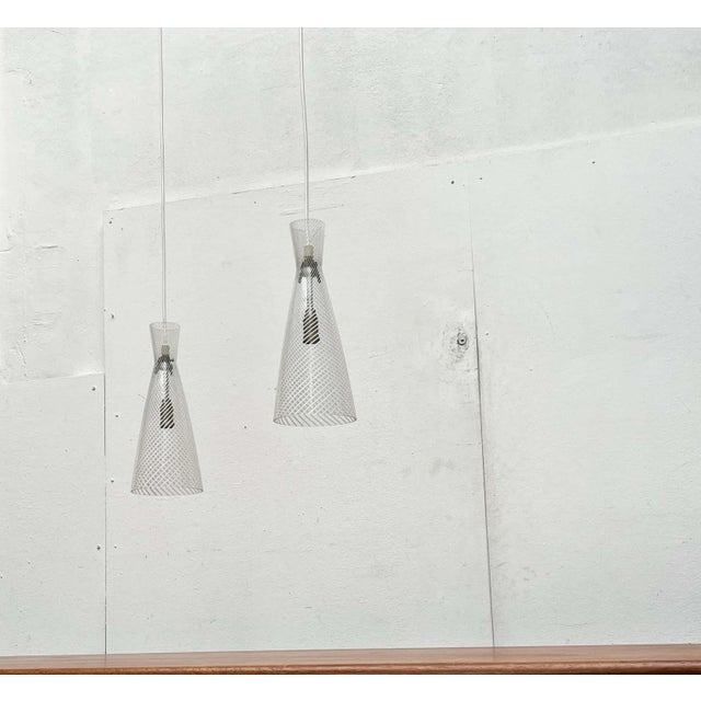 Impressive mid-century glass pendant lights by Peill & Putzler, designed by Aloys Ferdinand Gangkofner from the 1950s....
