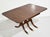 A polished, space-smart take on classic dining, this mahogany drop-leaf table blends Regency-inspired detail with mid...