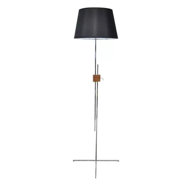 Hans Eichenberger Mid Century Modern Adjustable Chrome and Walnut Floor Lamp. Item features a sleek chrome frame with four...