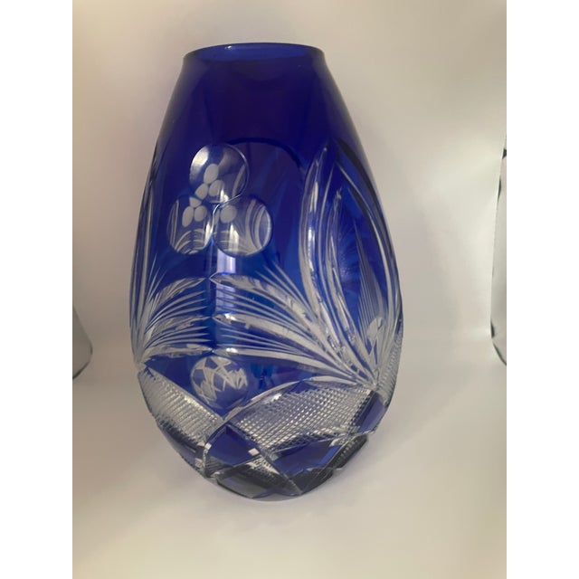 A striking Mid-Century Bohemian Ovoid lead crystal vase featuring exceptional hand-cut artisan craftsmanship. Originating...