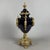 A masterpiece of watchmaking and design of the highest quality. This rare and majestic vase-shaped table clock is a piece...