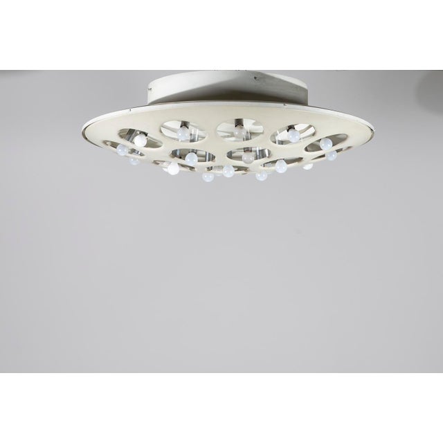 A rare and monumental model cp3529 chandelier, designed and produced by the prestigious italian lighting firm stilnovo...