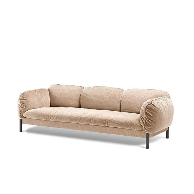 A modern interpretation of an elegant and classic design, this splendid three-seat sofa will make a refined addition to a...
