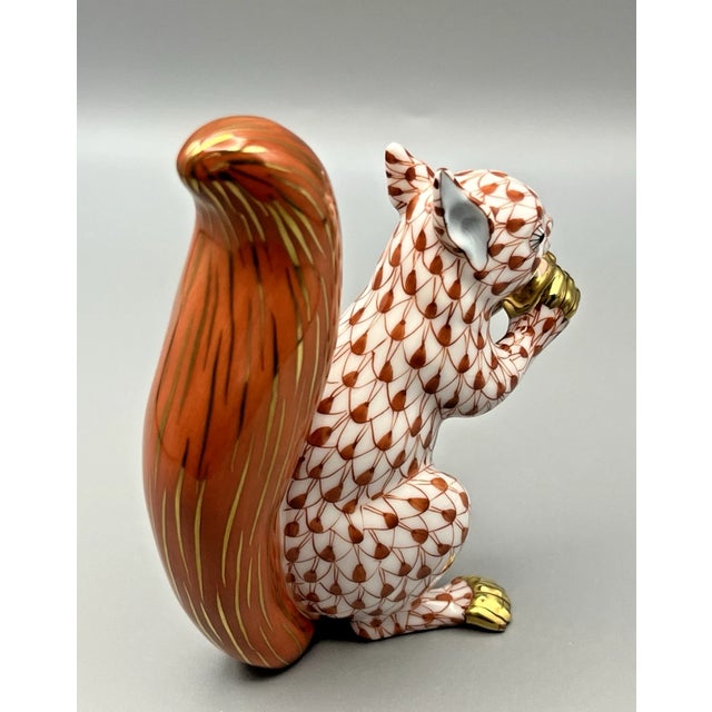 Add a charming touch of European elegance to your collection with this beautiful vintage Herend squirrel figurine....