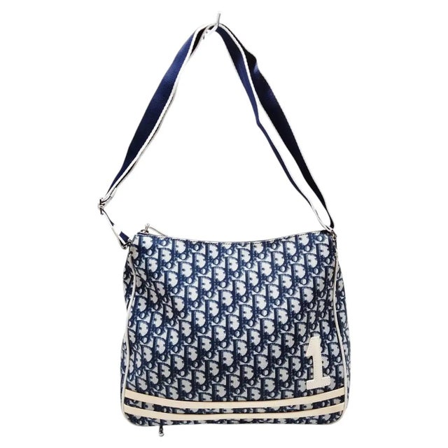 This authentic vintage Christian Dior crossbody bag is a standout piece from the iconic Galliano era, featuring the...