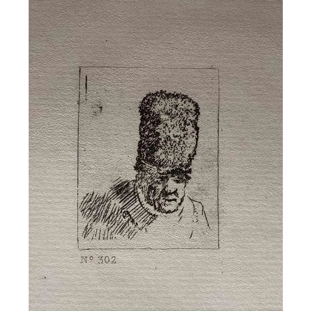 Head of an Old Man in High Fur Cap is an etching on ivory-colored paper realized after an etching by Rembrandt. This...