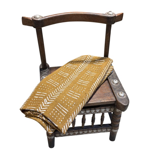 Authentic handwoven mud-cloth textile from Mali, crafted by artisans of the Bamana tribe. This striking cotton fabric...