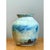 This vintage pottery vase is a small, painterly piece of studio ceramics, with a full, rounded body that swells at the...