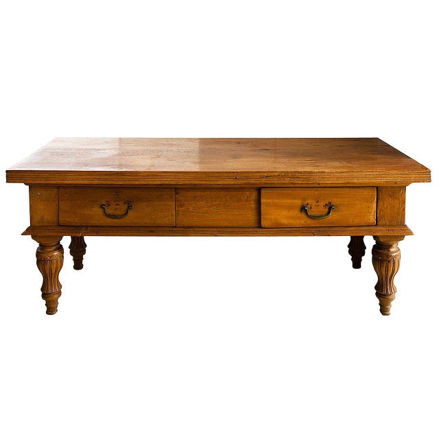 Rare. This beautiful teak wood colonial console has a single slab 2.5” beveled top. The antique raffles console table is...