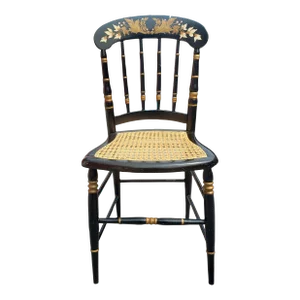 Late 19th Century Ebonized and Parcel Gilt Decorated Cane Seat Side Chair