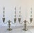 Pair of two-arm silver tone candelabras by Shrewsbury Holloware. Can also separate into single taper candle holders....
