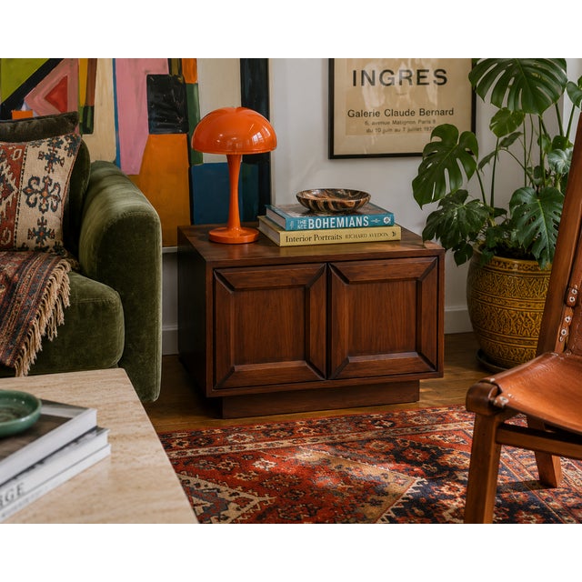An iconic Mid-Century Modern side cabinet designed by John Keal for Brown Saltman, featuring Keal’s signature sculptural...