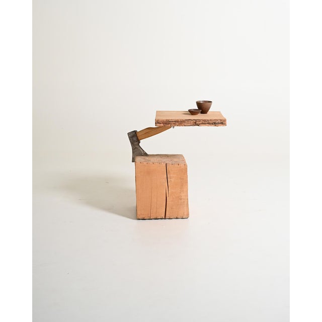 Solid wood and steel coffee table. Designed by Raphael Springmann, 21st century. Designed by Raphael Springmann, the...