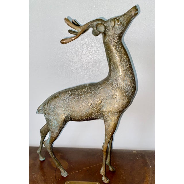 14 1/2 inches tall, brass reindeer