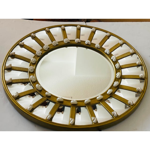 Beautiful 35” large round mirror, bevelled glass, segmented, decorated with white turbo mother of pearl sea shells.