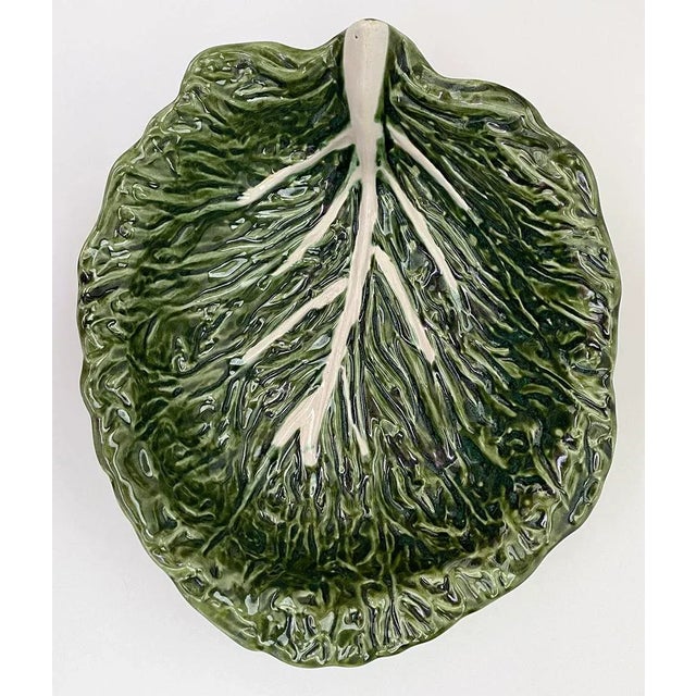 Vintage hand-made ceramic cabbage leaf serving bowl with glossy green majolica glaze. Made in Portugal. Bowl has chip on...