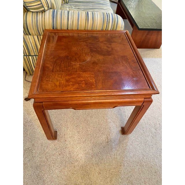 Mid-century solid wood side table. Features a classic horseshoe / horse-hoof feet and clean, traditional Ming-style...